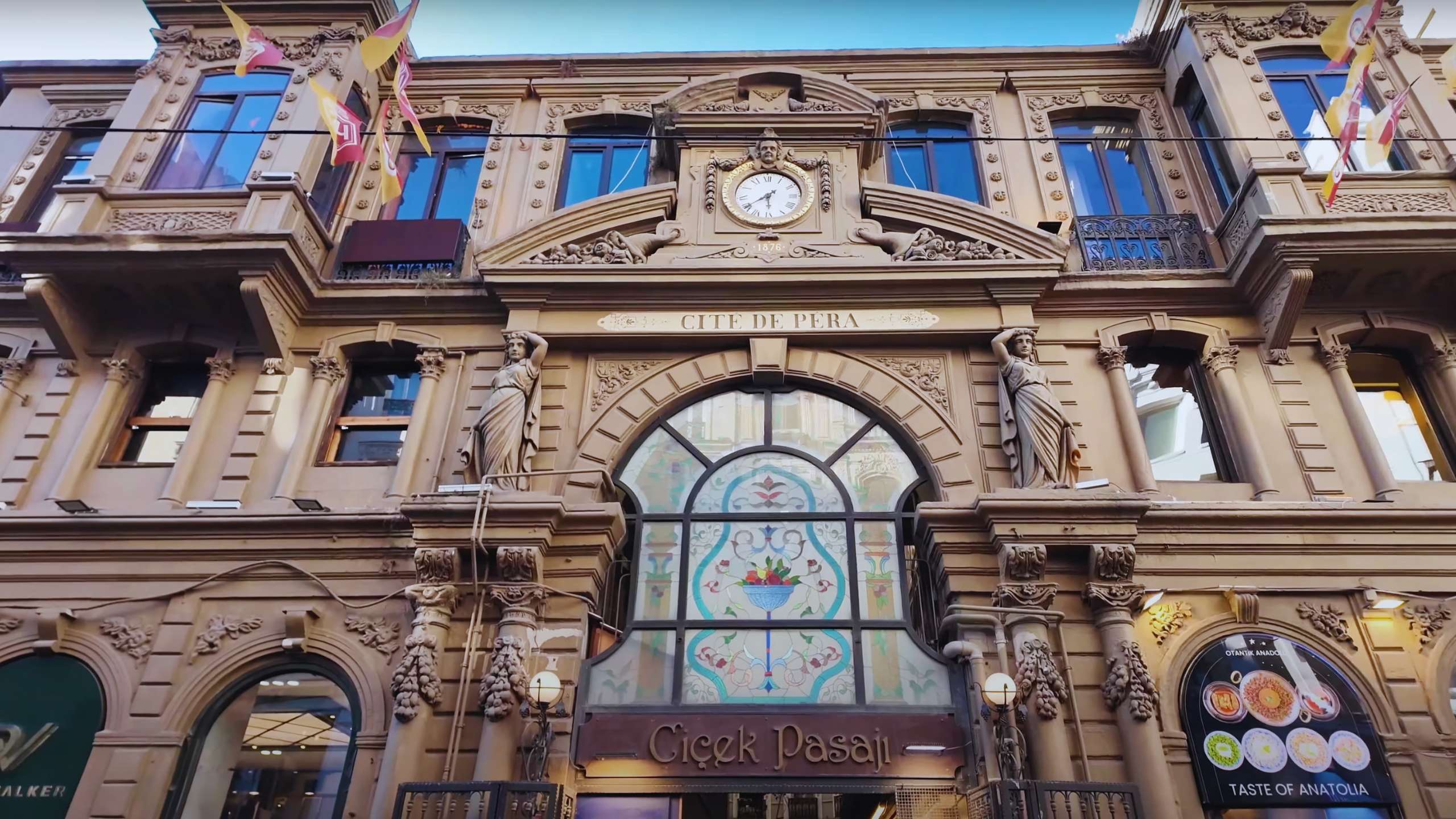 Ornate entrance to the historic Çiçek Pasajı with intricate architectural details.