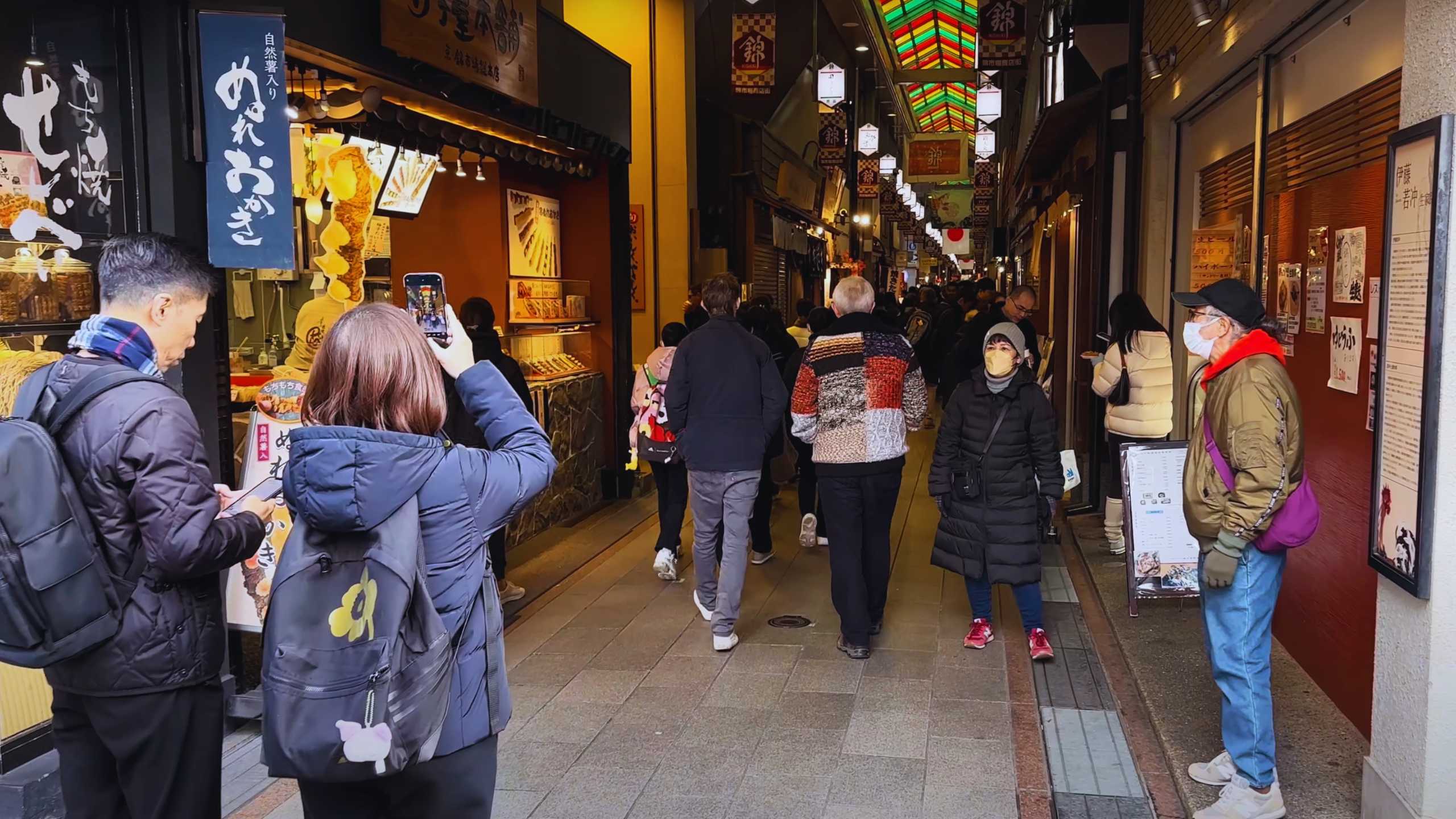 Nishiki Market bustling with visitors.