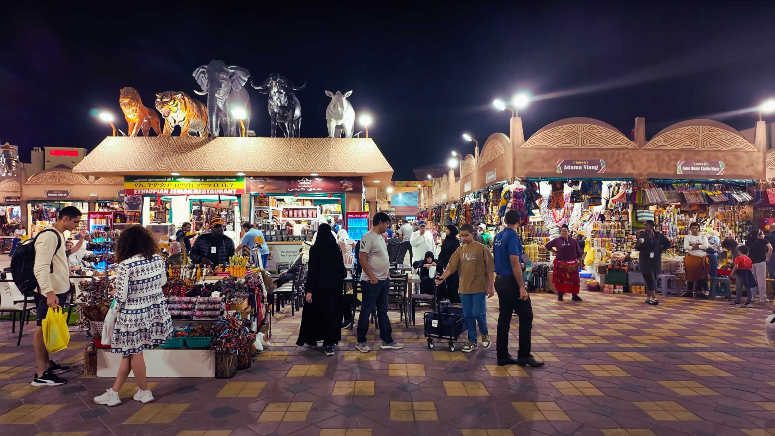 African market scene, lively with vendors and traditional crafts.