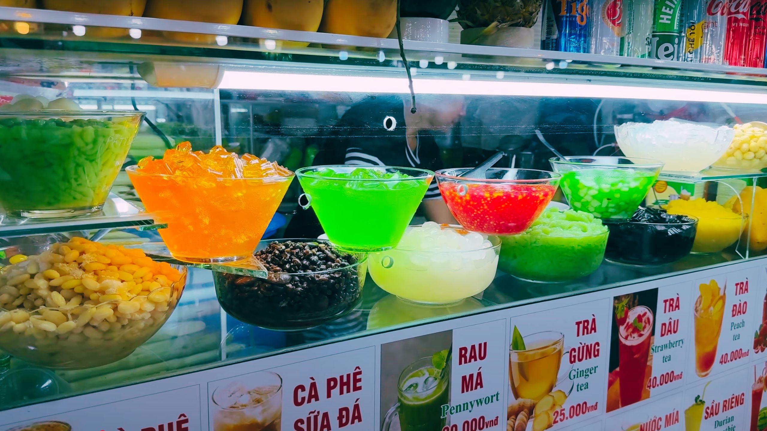 A colorful array of jellies, beans and fruit for traditional Vietnamese sweet drinks.